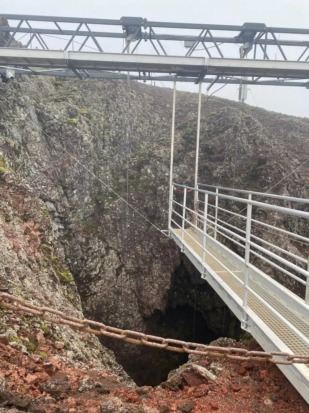 The steel walkway out to the lift over the crater mouth