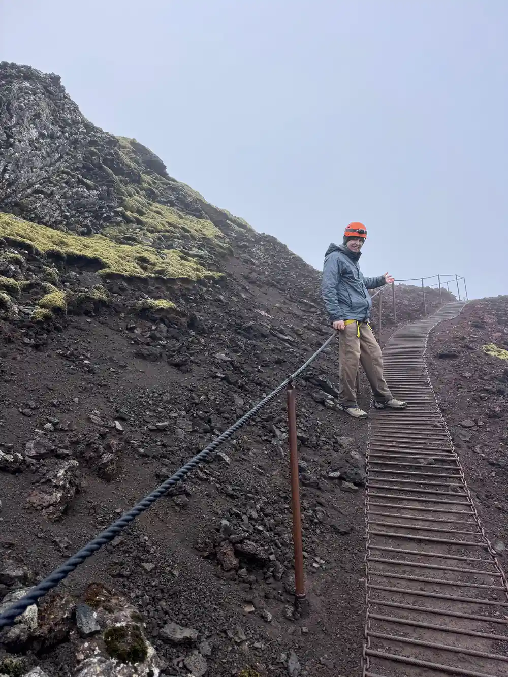 A walker on the stepped path up the side of the cone